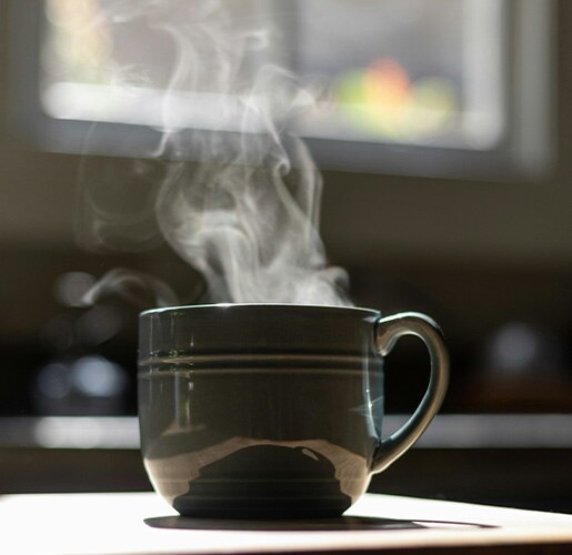 a cup of steaming coffee